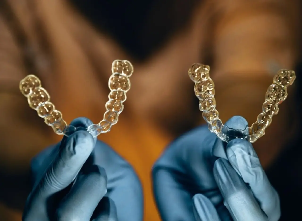 What is the difference between Impress and Invisalign?